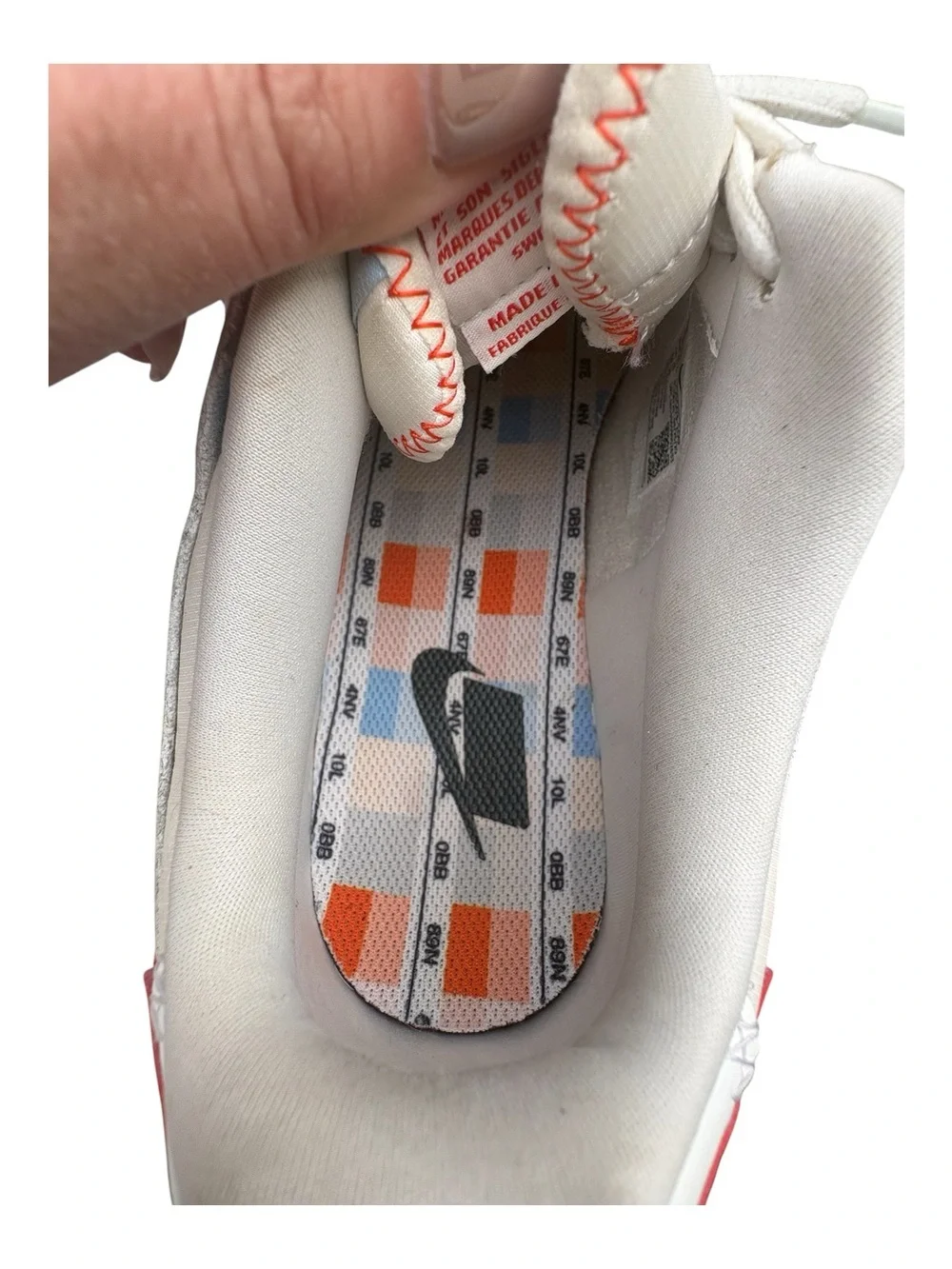 Nike Women’s White Sneakers with Orange Swoosh and Light Blue Accents